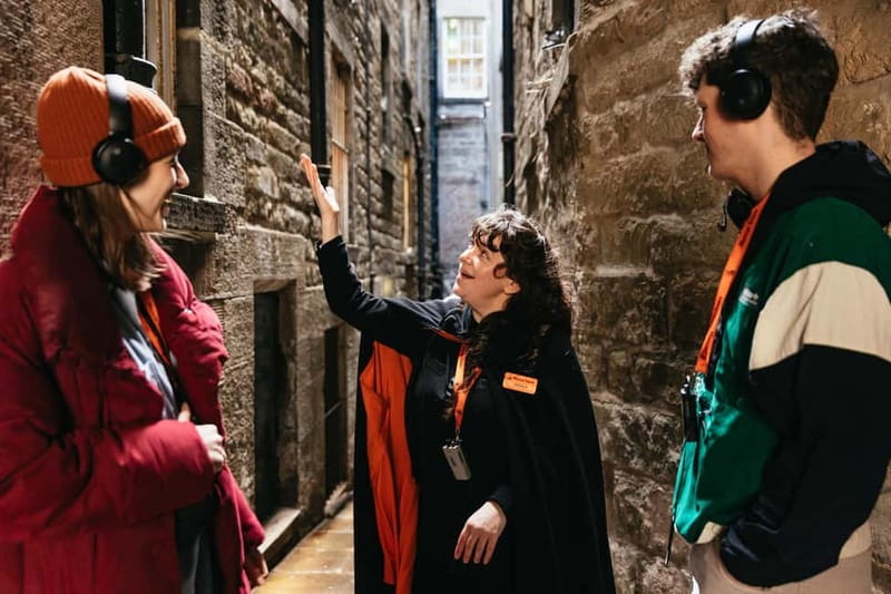 Edinburgh: Underground Vaults Evening Ghost Tour with Whisky - Hearing the story clearly with TourTalk devices