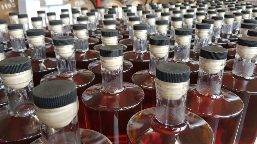 Eindhoven: Bottle Distillery Tour and Tasting Experience - Following the process from ingredients to bottle