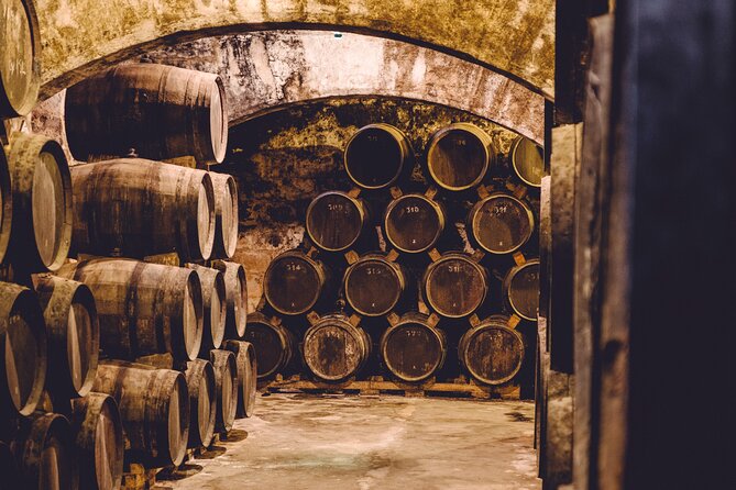 Palma Distillery Tour with 3 Spirits and Gourmet Tapas Tasting - Inside Bodegas Suau’s cellar since 1851
