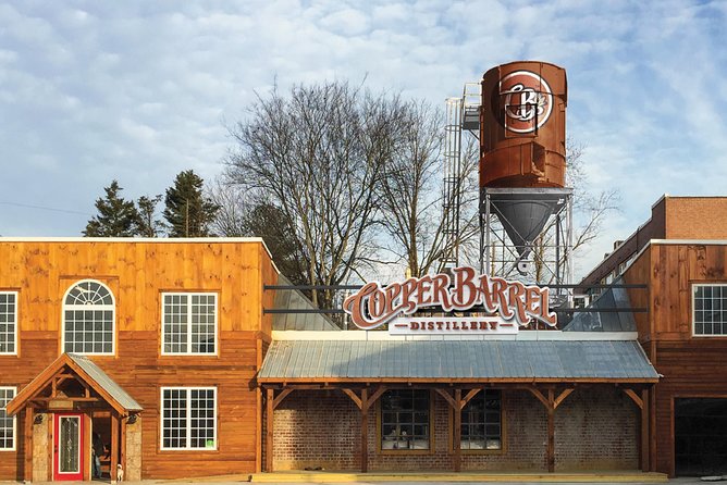 Skip the Line: Copper Barrel's Premium Distillery Tour & Tasting - Entering a historic Asheville distillery
