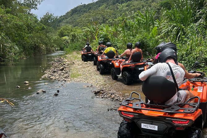 St Lucia ATV Tour : Waterfall, Plantation, Beach and Distillery - Riding Roseau Beach and stopping at Clive’s